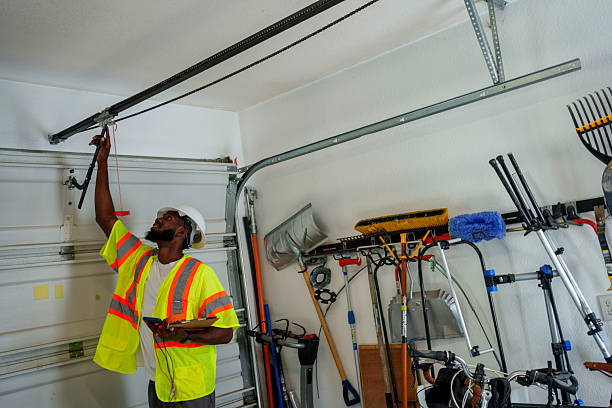 Professional Garage Door Panel Replacement technician working in Beechwood, MS